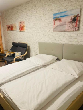 FeWo 41 - Appartement im Rottalblick - Südländischen Flair genießen mit Bademantelgang zur Therme, TV, Balkon und persönlichem Gästeempfang von Astarte Estate